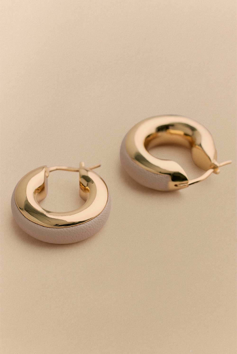 Lutra Huggie Earrings